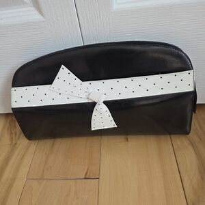 Elegant Black and White Clutch with Bow Accent